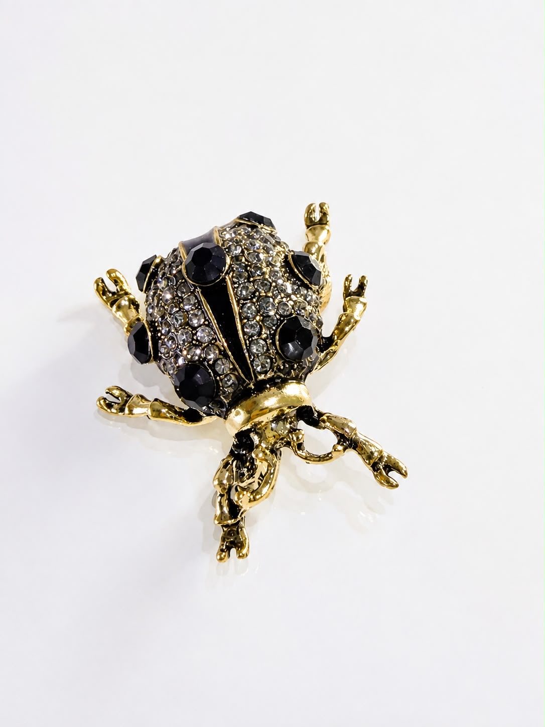 Broche Besouro